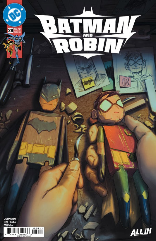 DC COMICS BATMAN AND ROBIN #28
Comic book cover featuring Batman and Robin with a hand holding a toy Robin figure.