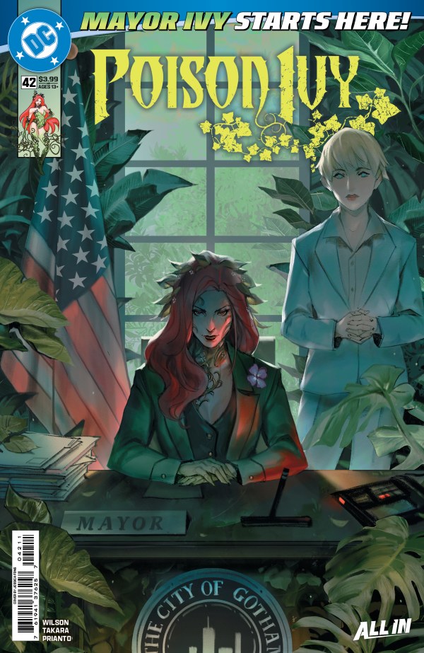 DC COMICS POISON IVY #42
Comic book cover featuring a character at a desk with an American flag and another character in the background.