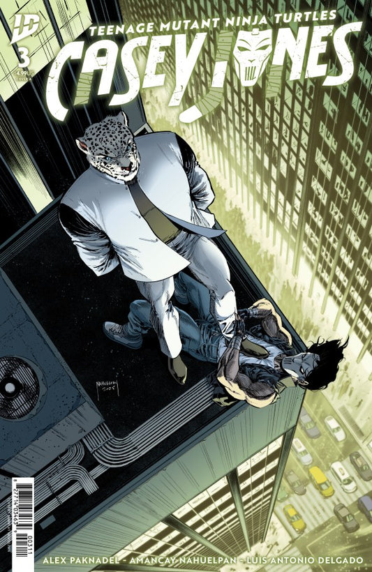 IDW COMICS TEENAGE MUTANT NINJA TURTLES: CASEY JONES #3
Comic book cover featuring a character in a suit with a mask, standing on a building edge with a cityscape background.