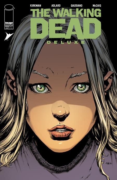 IMAGE COMICS WALKING DEAD DELUXE #135
Comic book cover of 'The Walking Dead Deluxe' featuring a character with green eyes.